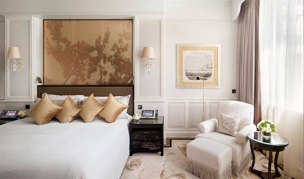 Habitación del hotel The Peninsula Hong Kong cama y decoración