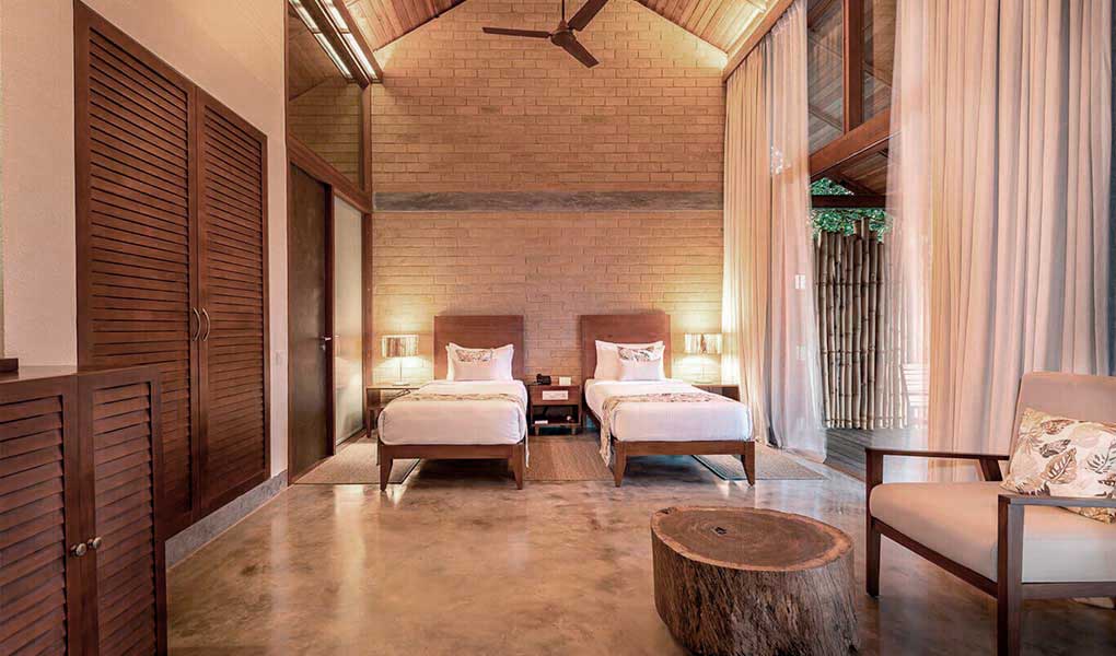 Habitación interior en Prakriti Shakti cabañas wellness retreat India