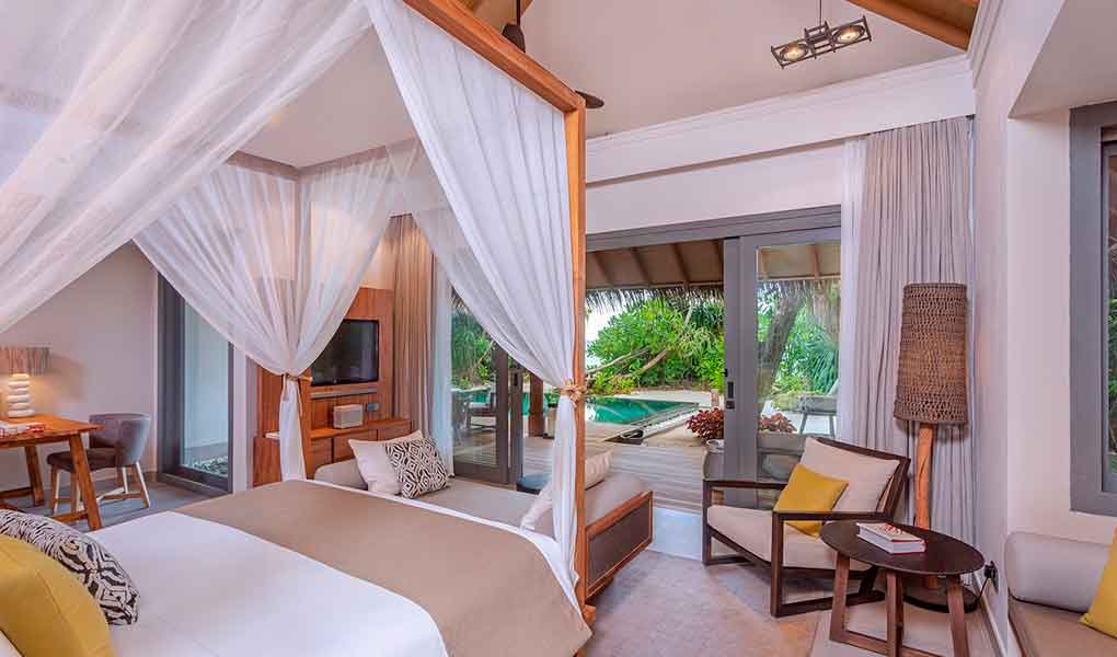 Vakkaru Maldives interior de la villa sobre el agua