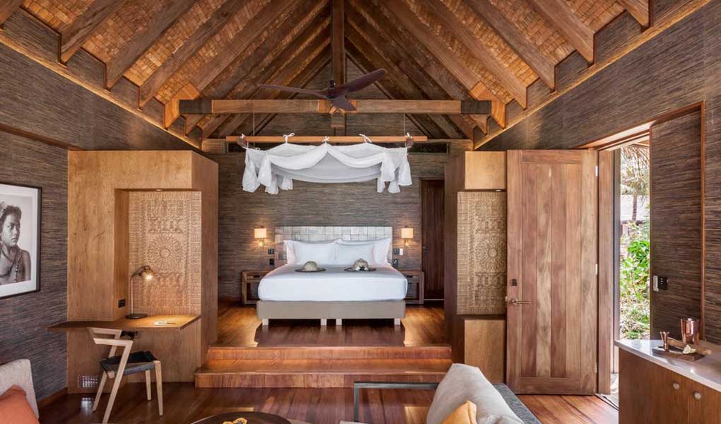Decoración de la villa en madera tradicional Six Senses Fiji